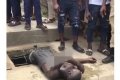 Young Man Discovered Inside a Dirty Canal In Mushin, Lagos (Photos+Video)