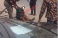 Drama As Woman Suddenly Collapses In Front Of Zenith Bank In Lagos (Video) 