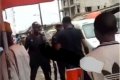Angry Young Man Seen Fighting Back As SARS Officers Try To Search His Phone In Lagos (Video) 