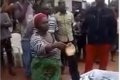 Woman Accused Of Killing Her Neighbour, Forced To Swear With The Dead Body In Abia State (Video) 