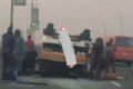 OMG! Many Escape Death As Commercial Bus Tumbles On The 3rd Mainland Bridge In Lagos (Video)