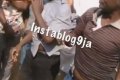 Two Men Disgraced Publicly After Being Caught Picking Human Hair In Abuja (Video) 