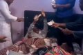 Too Much Money! Young Men Wake Their Friend Up By Hitting Him With Cash On His Birthday (Video) 