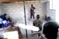 Wow! Nigerian Soldier Seen Preaching To His Colleagues With His Gun Strapped To His Chest (Video) 