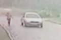 CCTV Captures N*ked Man Chasing Woman Down Deserted Road In A R*pe Attempt