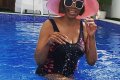 Wow! 63-Year-Old Betty Irabor Looks Youthful As She Shows Off Swimming Skills In One-Piece Swimsuit (Video)