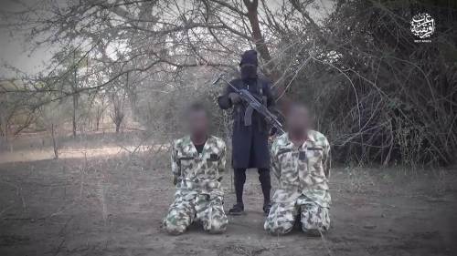 ISIS Releases Video Of 12-year-old Terrorist Executing Two Nigerian Soldiers