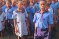 Trending Video Of School Pupils Singing The National Anthem In Their Flooded School Premises 