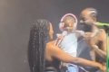 Simi And Daughter Deja Warm Hearts As They Surprise Adekunle Gold On Stage At His Dallas Show (Video) 