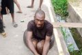 Suspected Thief Allegedly Nabbed Trying To Break Into A Compound In Owerri (Photos)