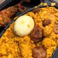 Nigerian Lady Reportedly Orders Banga Rice, Chicken And Plantain For ₦150k 